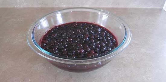 Blueberry-lime jam in pyrex bowl